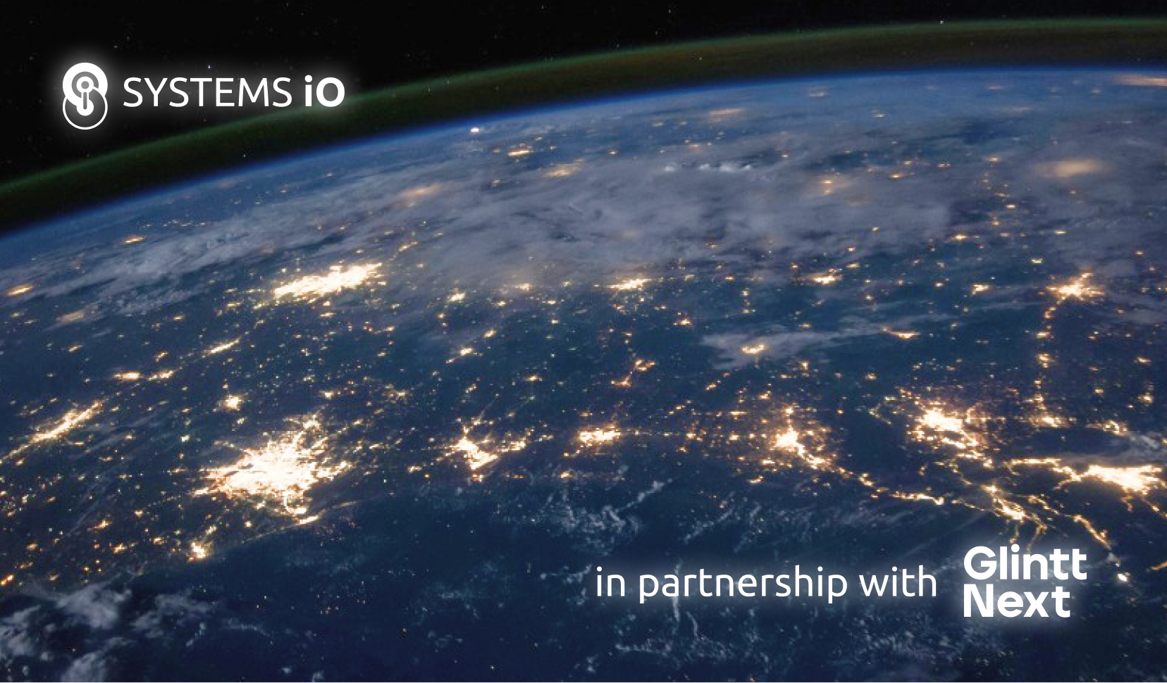 The world as seen from space, in black and white, with cities lit up at night and the Systems iO logo and Glintt Next's logo