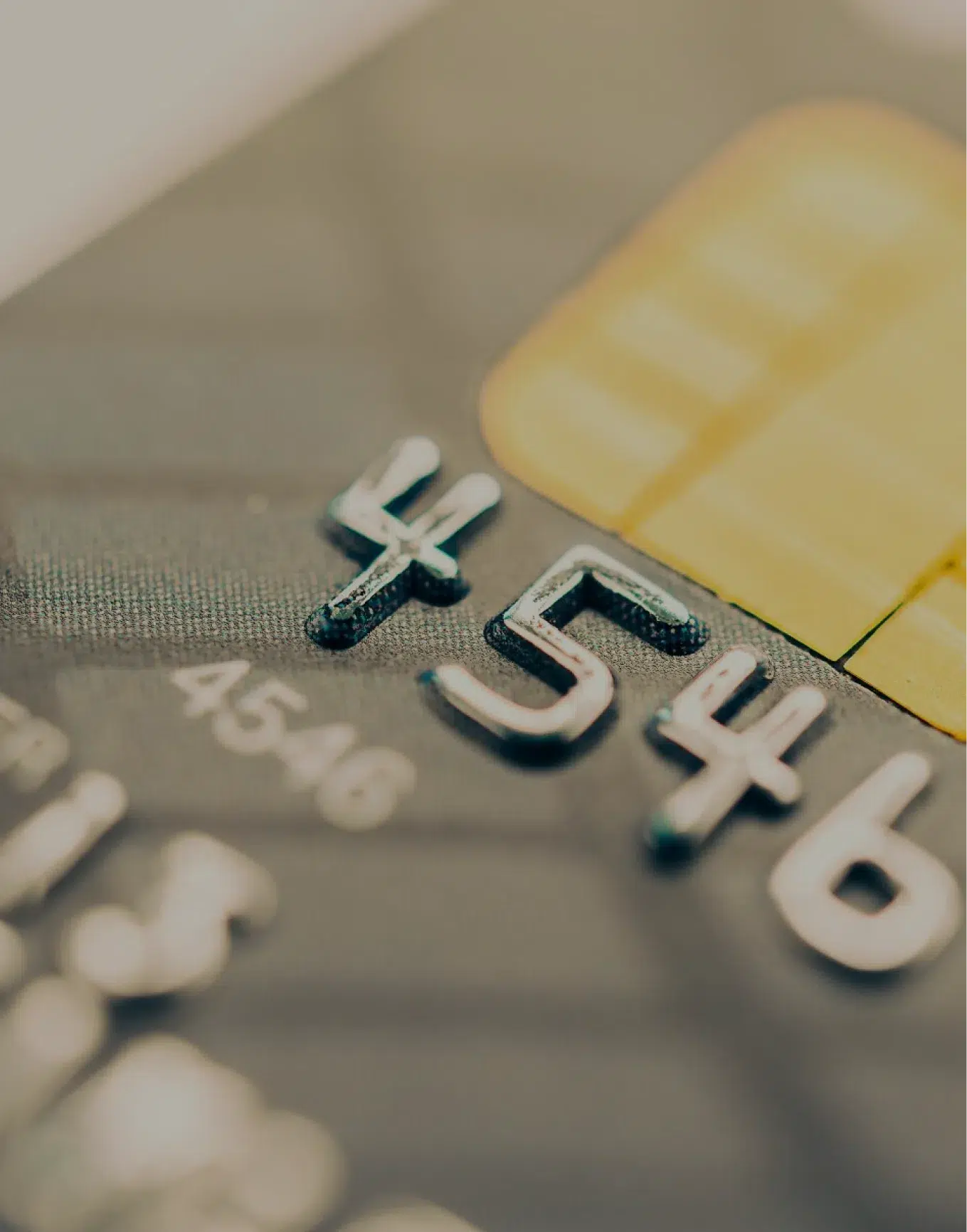 Close-up of a bank card with visible chip details.