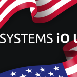 The 'Systems iO' logo with an added 'US' as a suffix in front of two waving American flags.