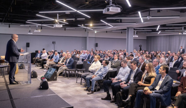 Christian Kitchen (CIO UK, Marsh) delivers an opening keynote in a packed conference hall.